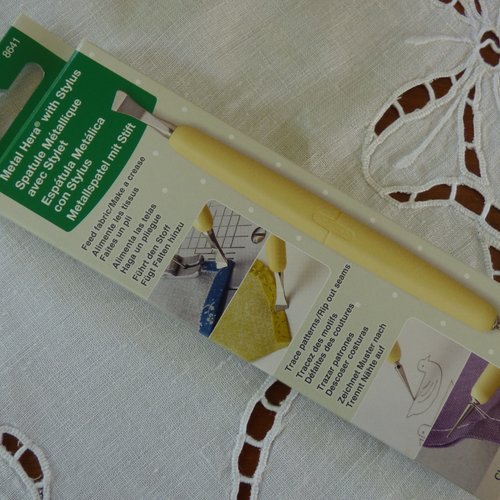 Spatule métallique avec stylet