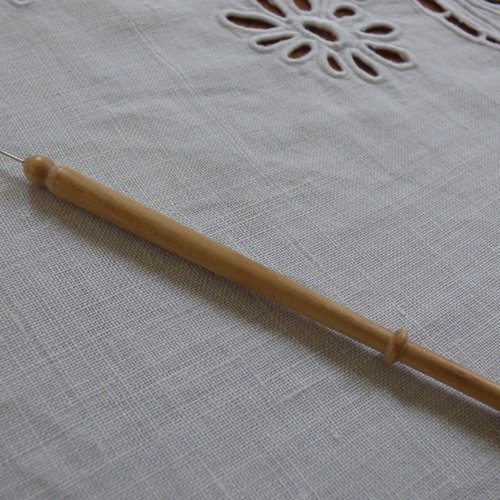 Oeil magique pour dentelle aux fuseaux