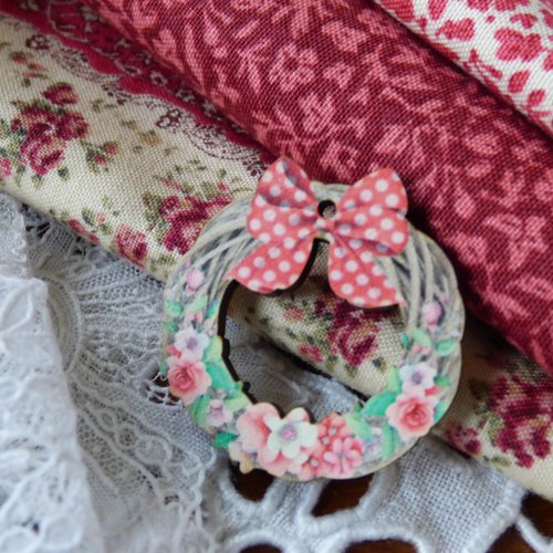 Bouton en bois couronne de porte noeud rose