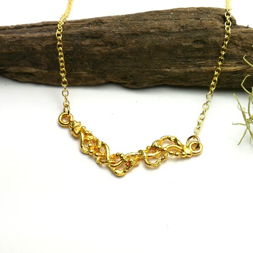 Collier ras de cou doré à l'or fin volubilis collier minimaliste torsadé
