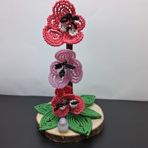 Fleur orchidée ton rose foncé et rose clair en perles de rocailles