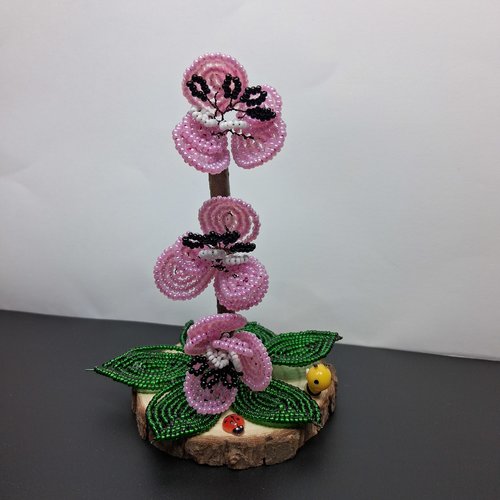 Fleur orchidée rose clair en perles de rocailles