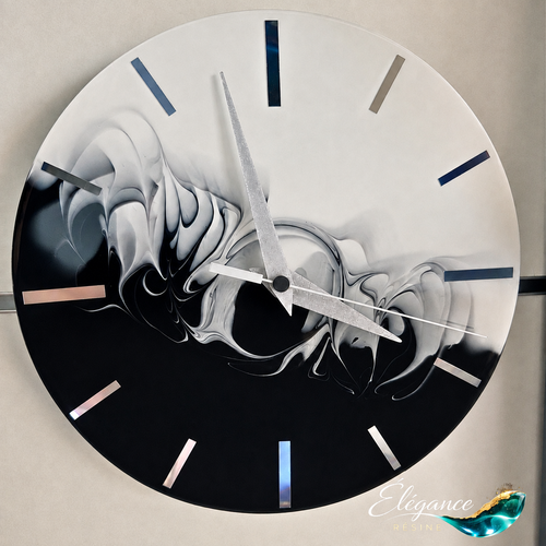 Horloge murale design 27cm en résine noire et blanche – éclipse d’encre