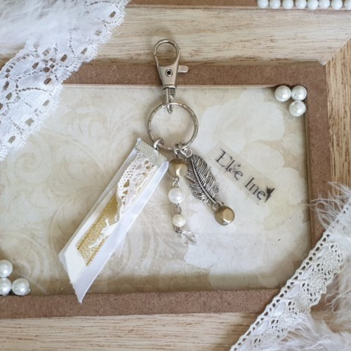 Bijoux pour sac à main plumes beige et doré