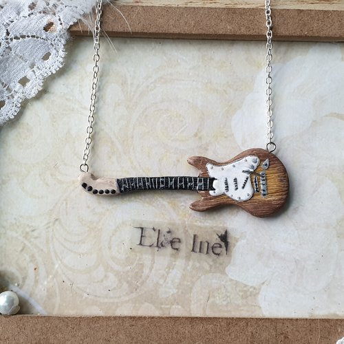 Collier guitare électrique en polymere