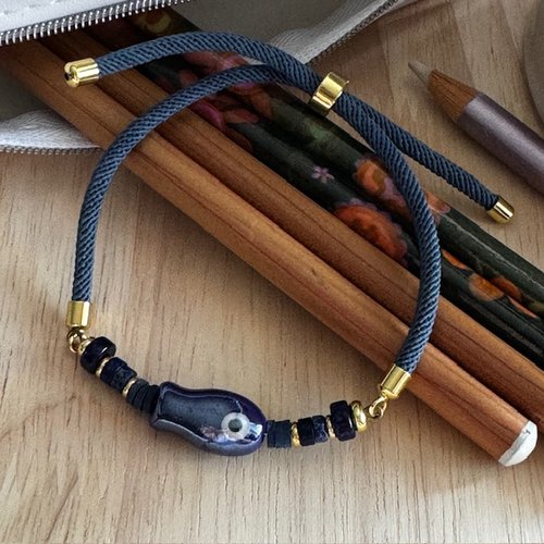 Bracelet réglable cordon torsadé perle poisson
