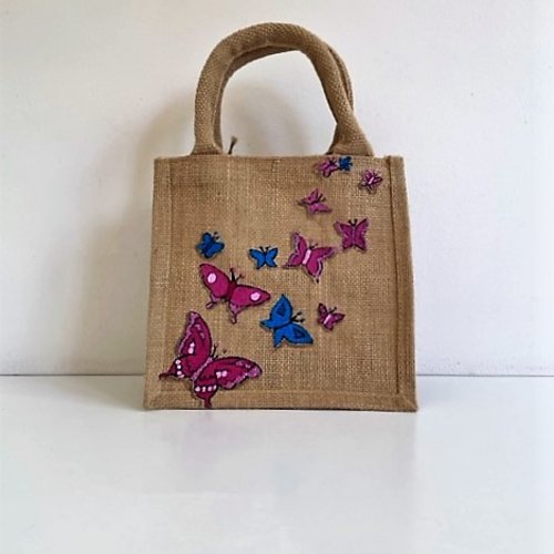 Mini-sac en jute, avec une envolée de papillons