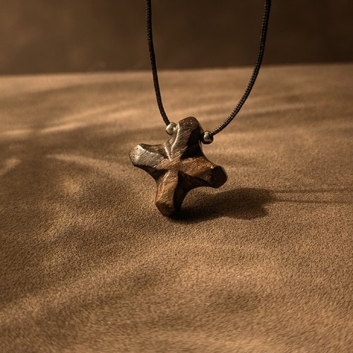 Pendentif en bois de palissandre - sculpté en forme d'étoile, avec cordon ciré