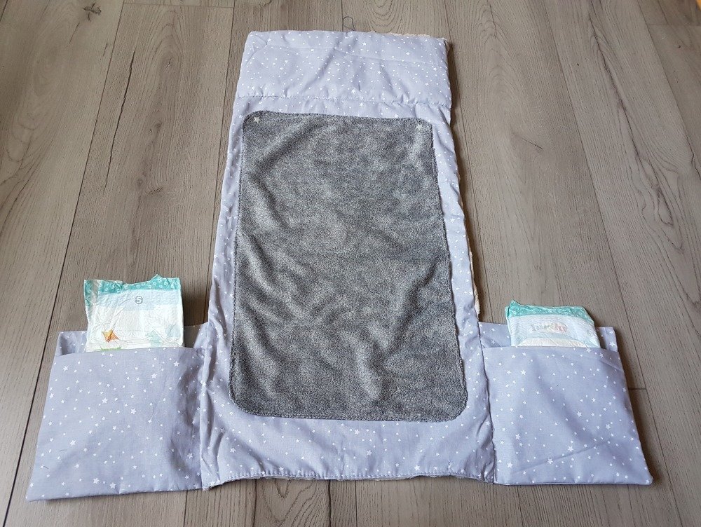 Tapis à langer nomade pliable - Un grand marché