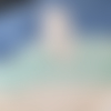 Couverture rayée et son doudou agneau coloris bleu, vert clair, écru, beige taille 100 x 90 cm