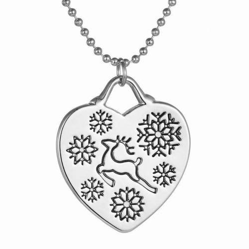 Pendentif coeur avec cerf  noël et flocon de neige