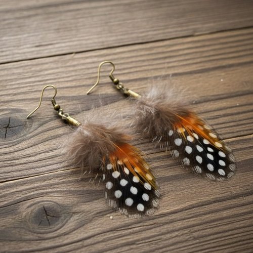 Boucles d'oreille plumes cholena  orange et noir, bijoux en amérindiens