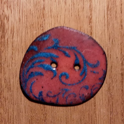 Bouton en émaux sur cuivre