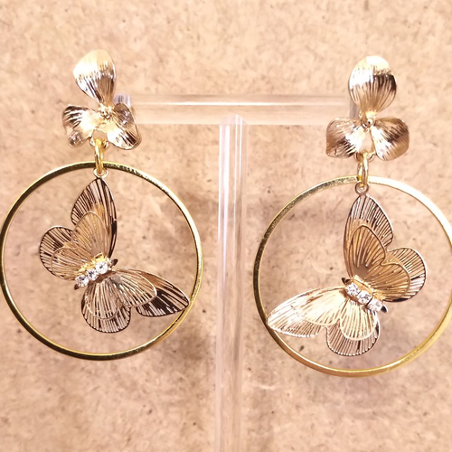 Boucles d'oreilles acier inoxydable doré papillon .