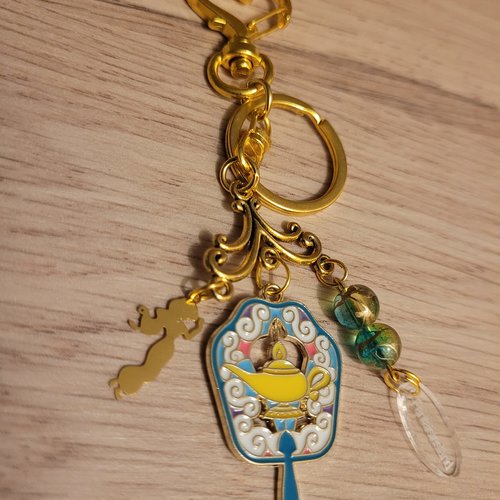 Porte-clés doré sur le thème de jasmine - accroche-clés