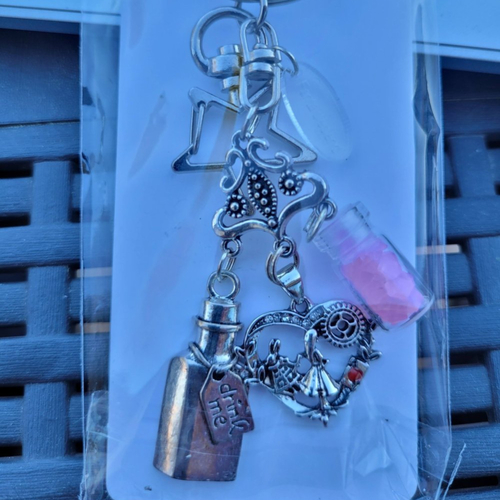 Wonderland accclés bijou de sac