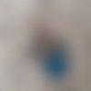 Bijou de szcou porte clés micro bille fiole cabochon bleu