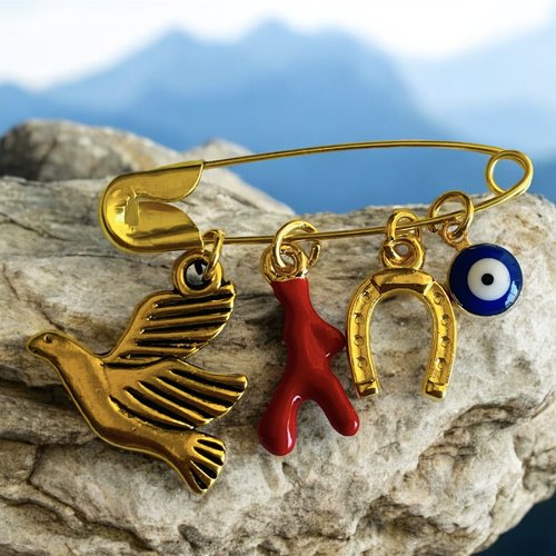 Broche ange, corne porte bonheur protection