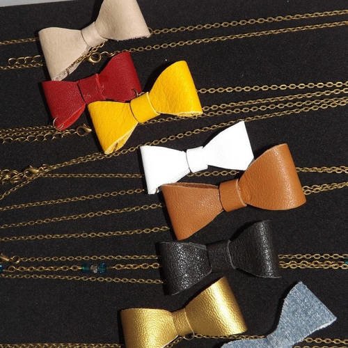 Un collier noeud , en cuir ou simili cuir doré ou jean bleu , un seul modèle à choisir 