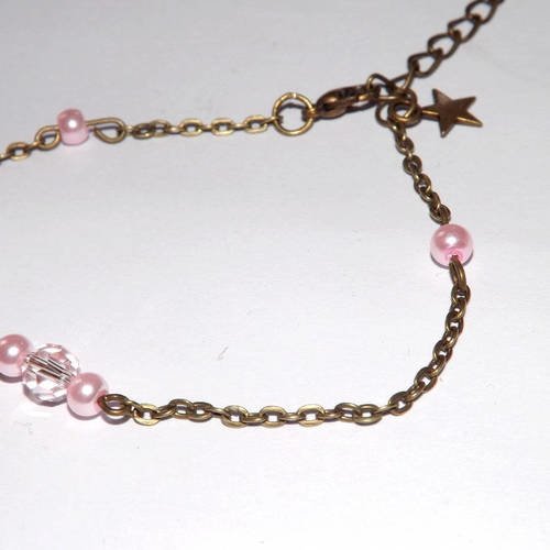 Tres jolie bracelet bronze "rosella" avec perle cristal,verre et breloque étoile,ton rose 