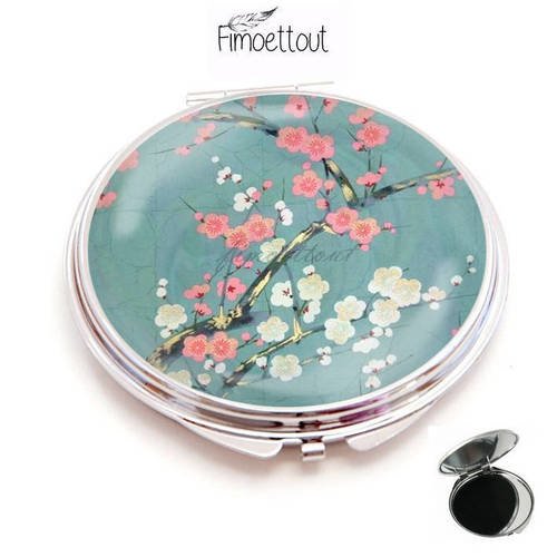 Miroir de poche , cabochon resine  fleur de cerisier fond turquoise 