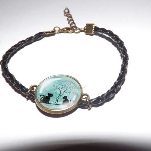 Jolie bracelet simili cuir tresse noir , avec cabochon en verre rond 18mm , chat amoureux ton bleu 