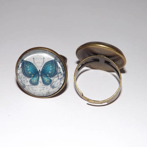 Jolie bague cabochon en verre 2 cm  papillon bleu , shabby romantique 