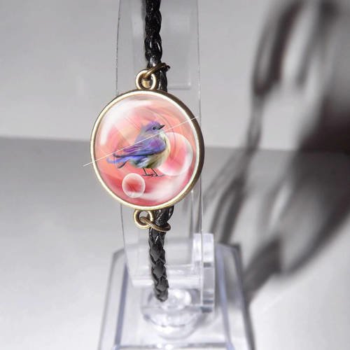 Jolie bracelet simili cuir tresse noir , avec cabochon en verre rond ,oiseau à jolie plume violette et bleue 