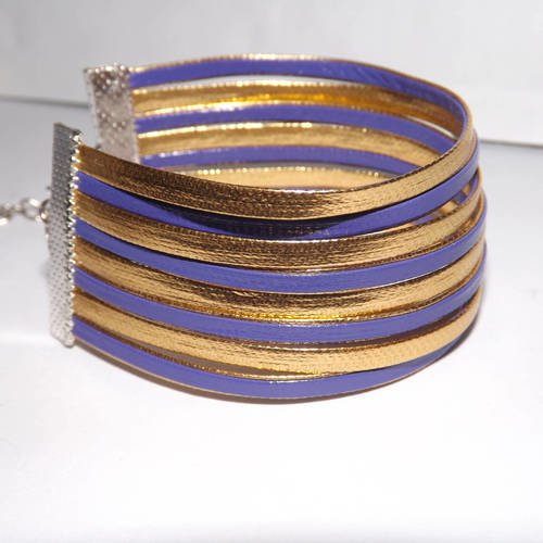 Manchette/ bracelet à lannière doré et violet prune, imitation cuir ,8 rangs 