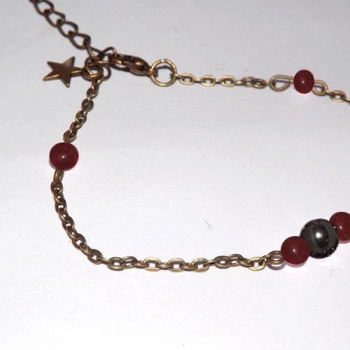 Tres jolie bracelet bronze "constellation rouge" avec perle hematite et jade rouge et breloque étoile, 