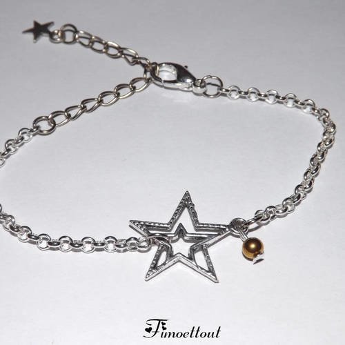 Tres jolie bracelet argenté double étoile - perle hématite doré 