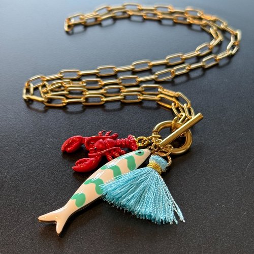 Collier en acier inoxydable doré, orné d’un poisson,  homard et pompon façon ibiza