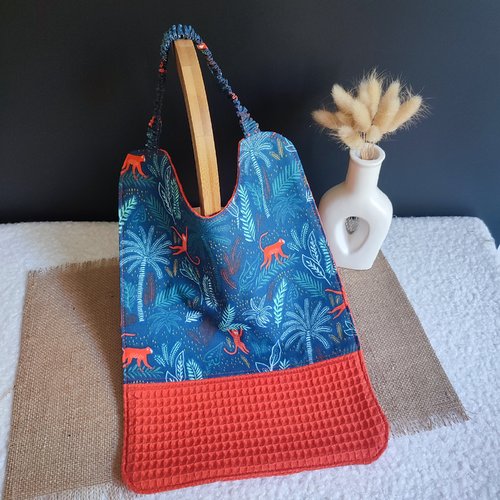 Serviette de cantine à élastique - jungle bleue & nid d'abeille orange
