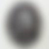 Pendentif volutes noir et blanc rond bombé verre avec feuille argentée 50mm