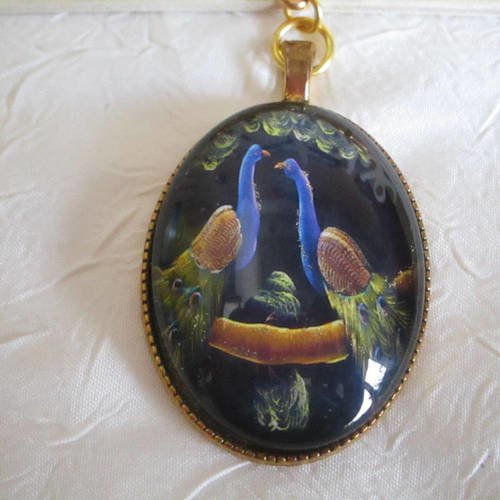 Broche en métal doré "un couple de paons"