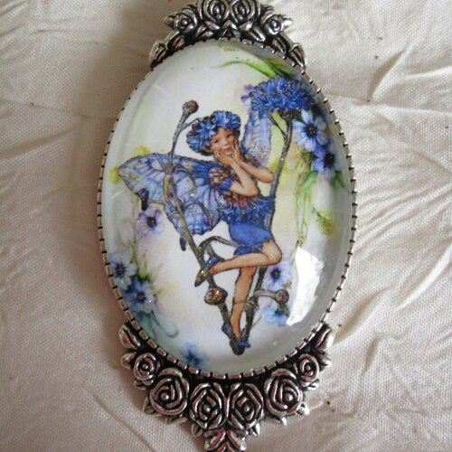 Broche en métal argenté &quot;un prince des fleurs bleu&quot;