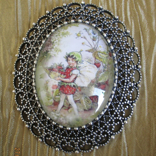 Grosse broche-pendentif en métal argenté et verre «une elfe des fleurs rouge»