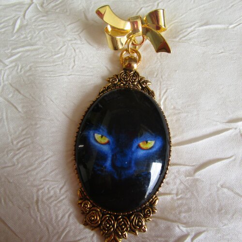 Broche métal argenté et céramique &quot;un chat noir aux yeux bleus&quot;