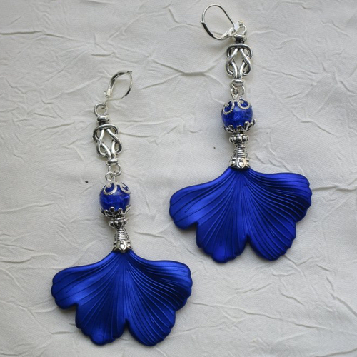 Ravissantes boucles d’oreilles en silicone et métal argenté