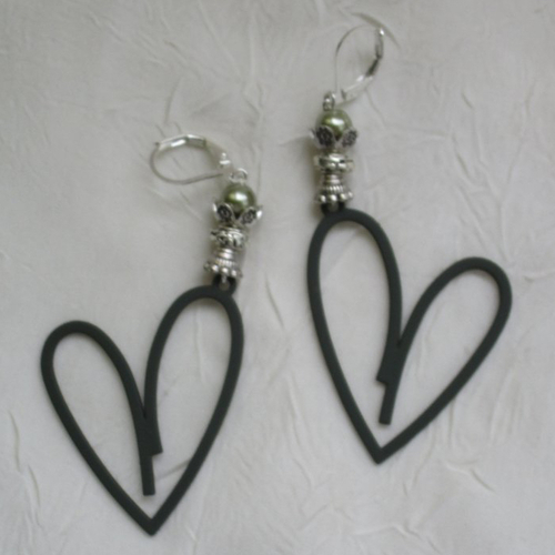 Ravissantes boucles d’oreilles en silicone et métal argenté