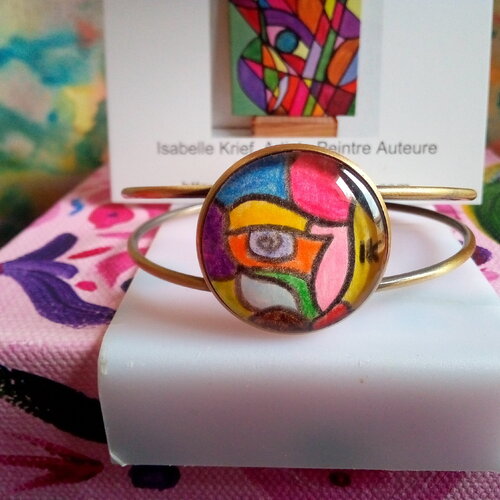 Peint artiste française,bracelet manchette laiton bronze avec cabochon rond 25mm,aquarelle originale oeil bleu rose vertne violet