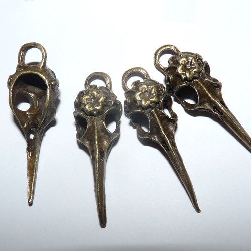 2 pendentifs crâne d'oiseau au long bec charms pour création de bijoux breloque tête d'animal