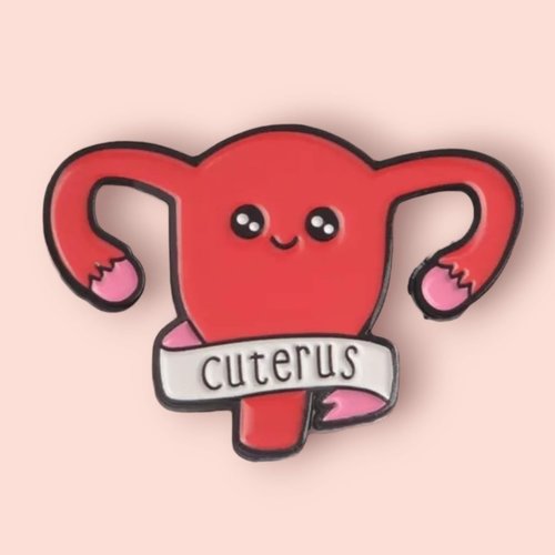 Pins  emaillé forme uterus rose féministe. cadeau militant femme
