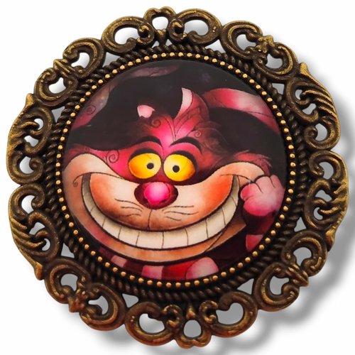 Broche ronde chat du cheshire. accessoire idée cadeau pays des merveilles.