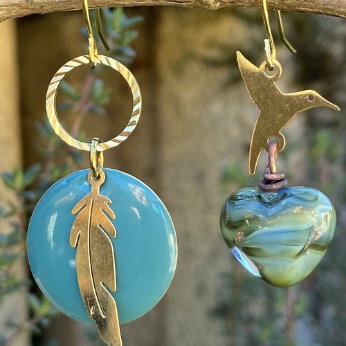 Boucles la plume et l’oiseau