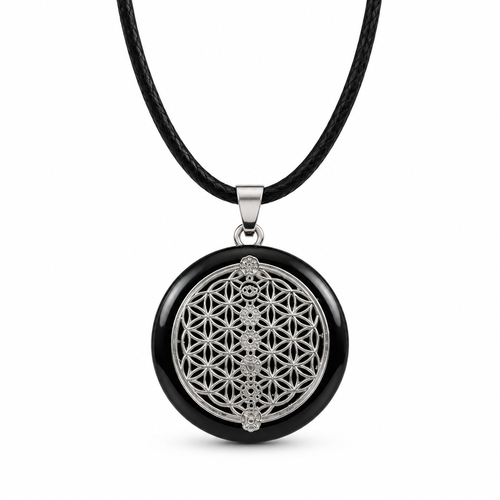 Pendentif artisanal à base de shungite • recto-verso • fleur de vie argentée sur fond noir • géométrie sacrée