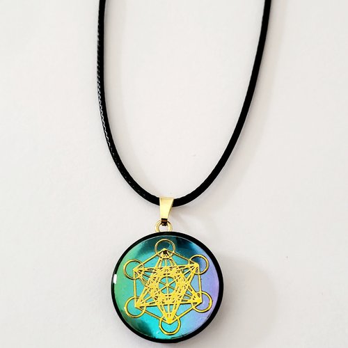 Pendentif artisanal à base de shungite - recto-verso cube de métatron doré sur fond turquoise/violet