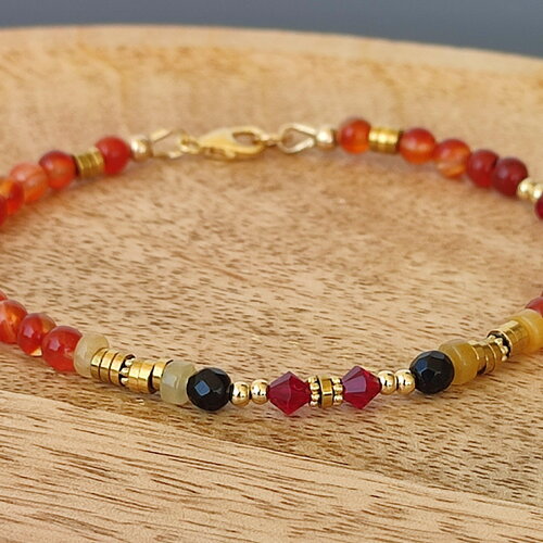 Bracelet en perles de cornaline, d' onyx, hématites doré sur gold filled