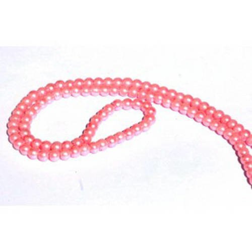 Perle ronde nacrée  3 mm  1 fil de ± 68 cm rose. 