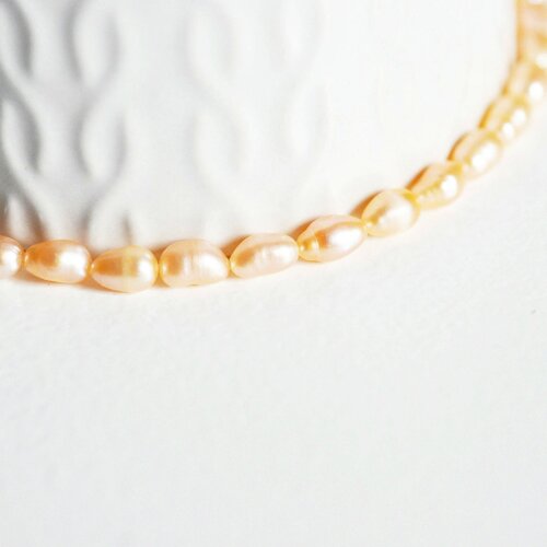 Perle naturelle pêche, perle ovale ,perle percée,perle de culture, création bijoux,perle eau douce,4-5mm, le fil,g2557